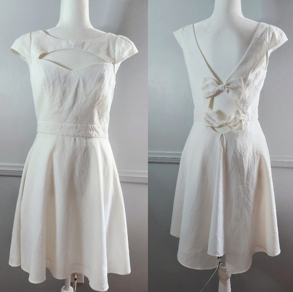 Minuet Bow Slit Mini Dress - Picture 1 of 7